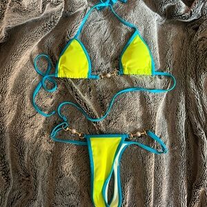 Neon yellow and blue bikini set - adjustable top and bottoms . Worn once